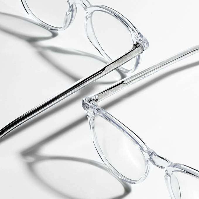 two pairs of clear eyeglasses